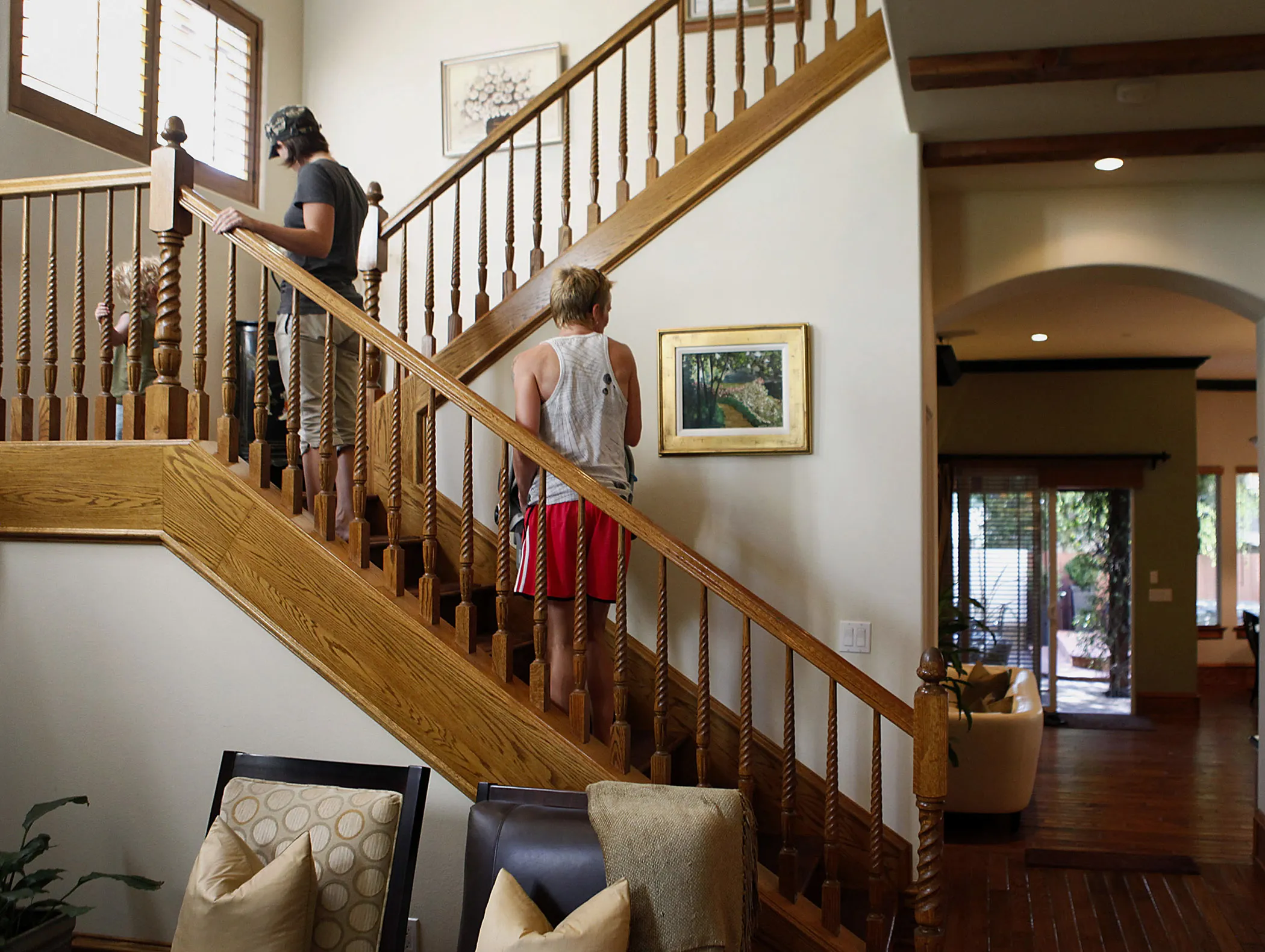 Potential home buyers view a home during an open house.