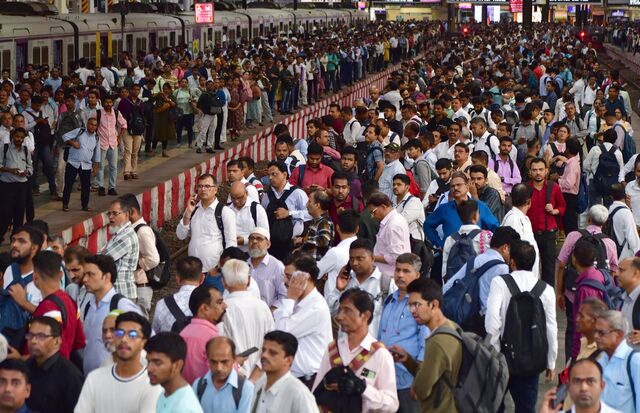 Crowds waiting for the train in Mumbai. India surpassed China as the world’s most populous nation in 2023. 