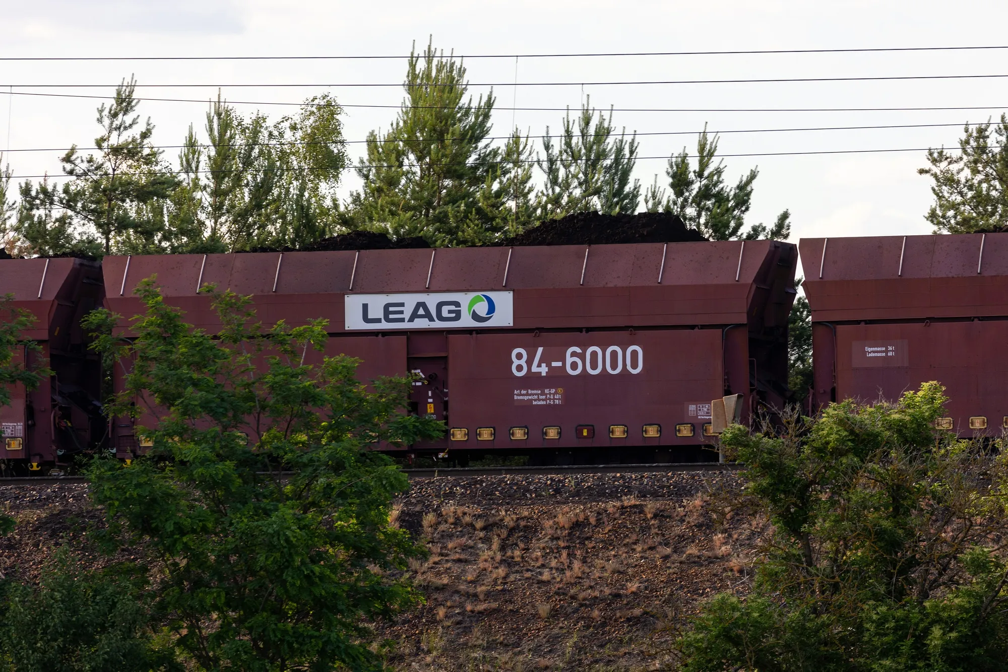 A freight train carries coal near the Jaenschwalde lignite mine in Peitz, Germany.