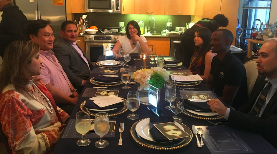 Seven diners gathered at the home of Veronica Perez, center, on Tuesday night in downtown L.A. 
