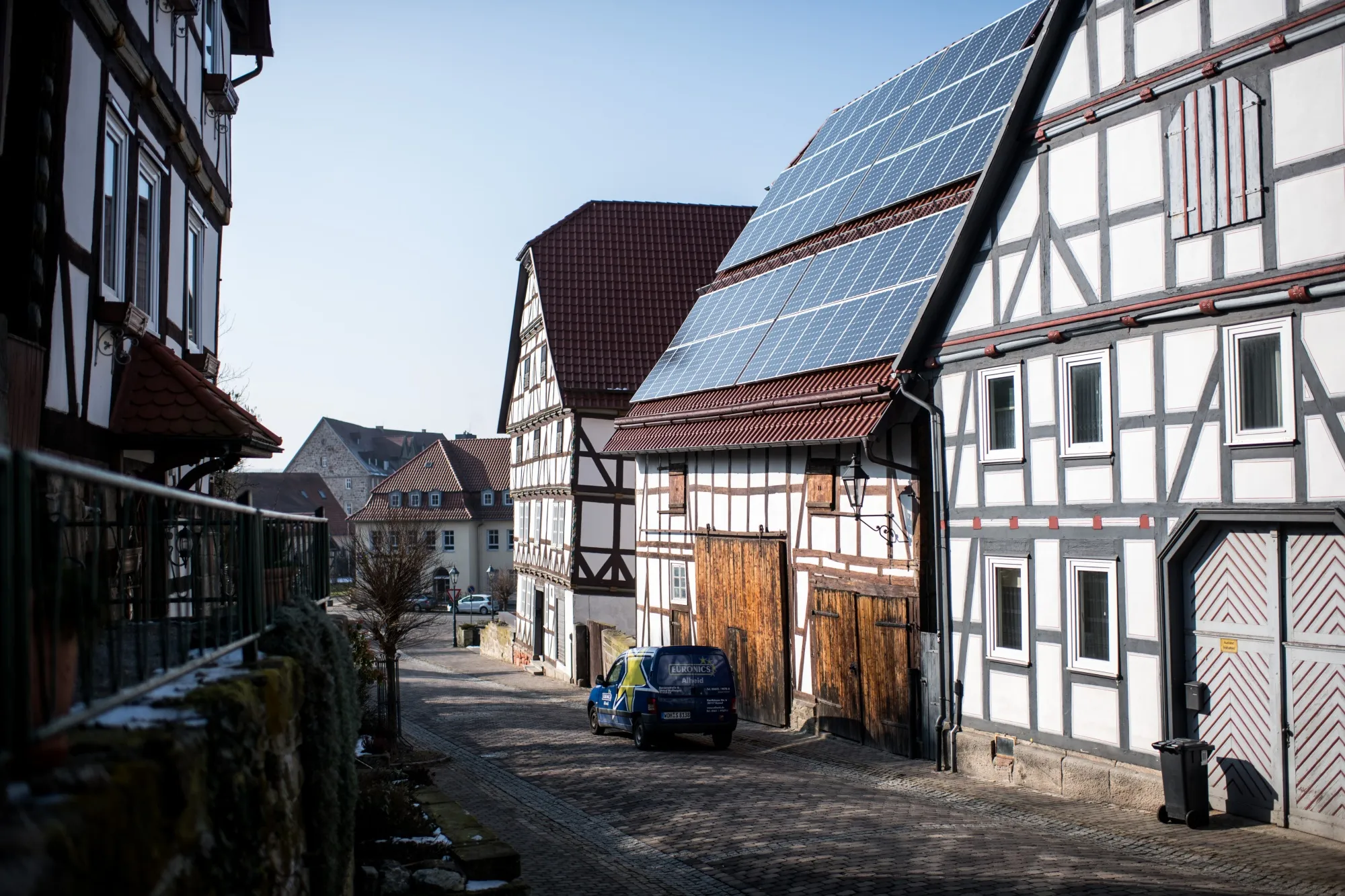 A solar panels sit atop a house in the town center of Wolfshagen, Germany.