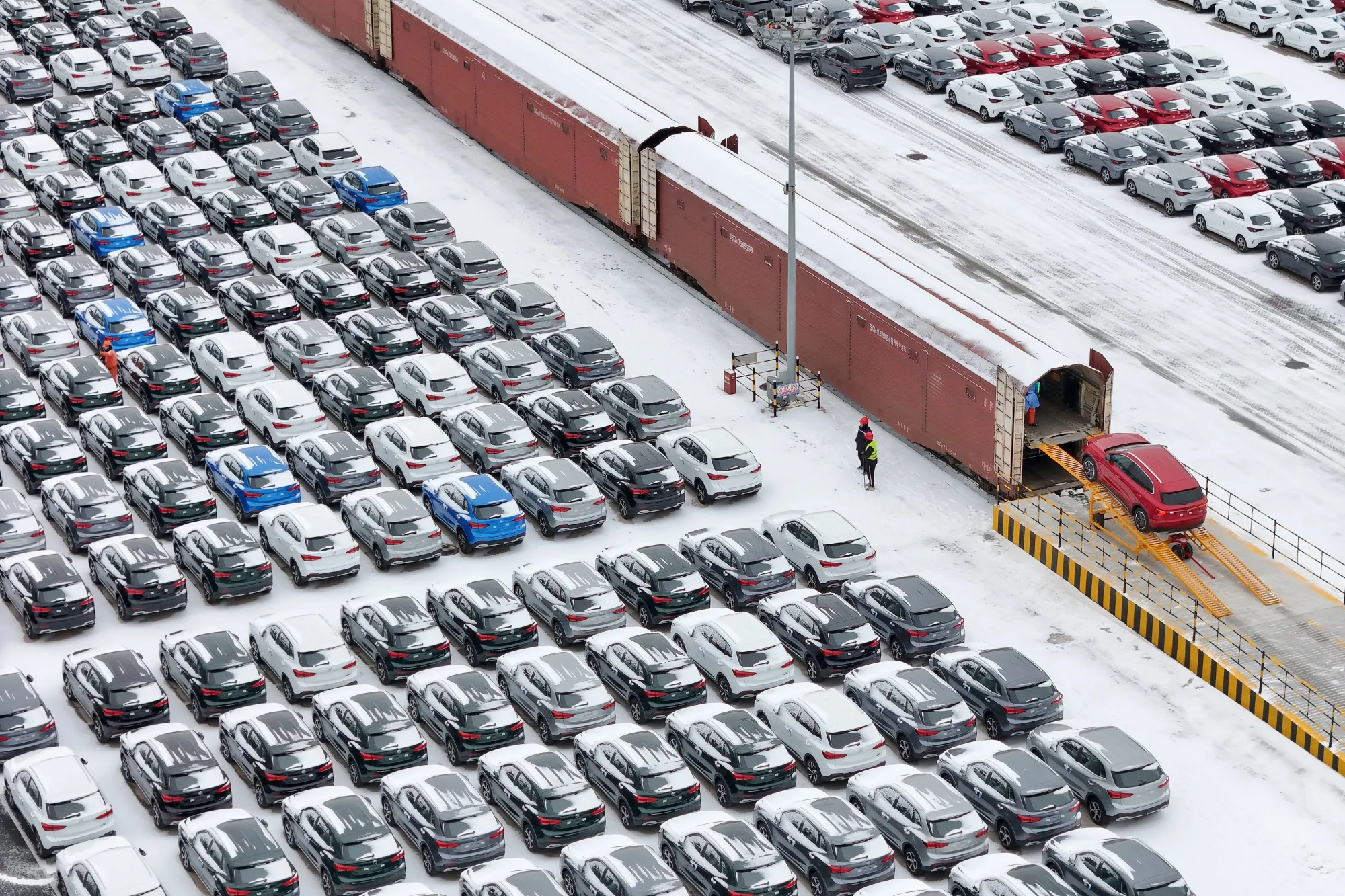 Vehicles bound for export at a port in China.