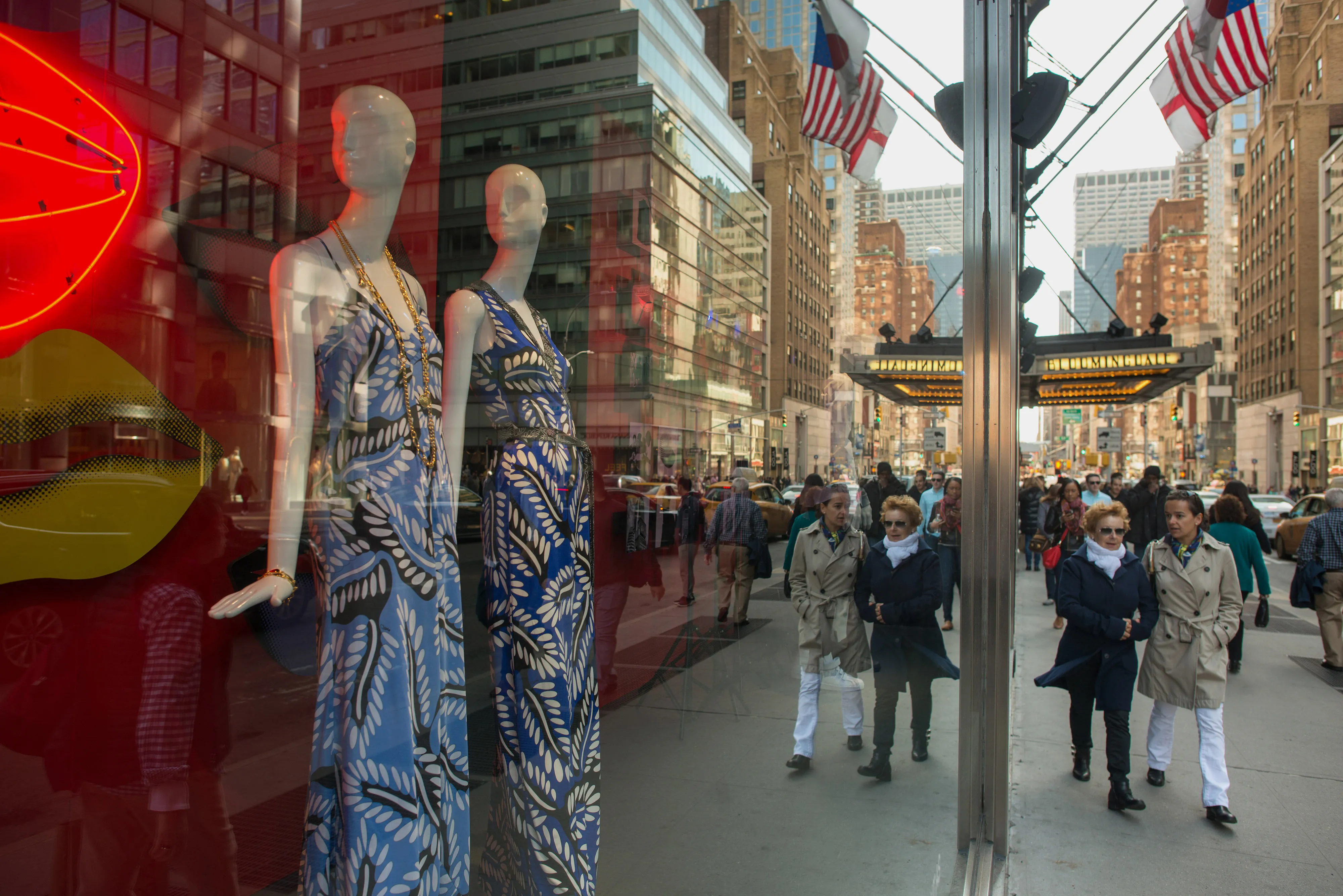 Shoppers stroll past the window displays in Manhattan's Upper East Side in New York, U.S.
