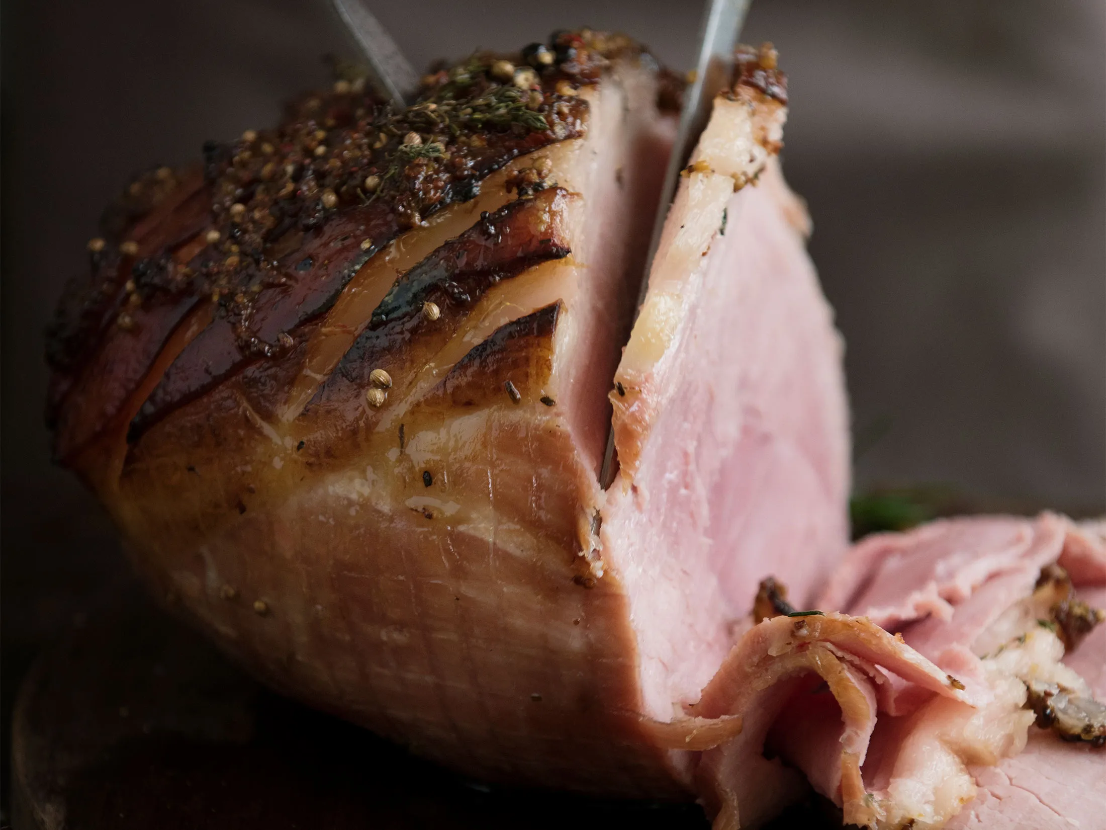 Slicing a baked ham food photography recipe idea