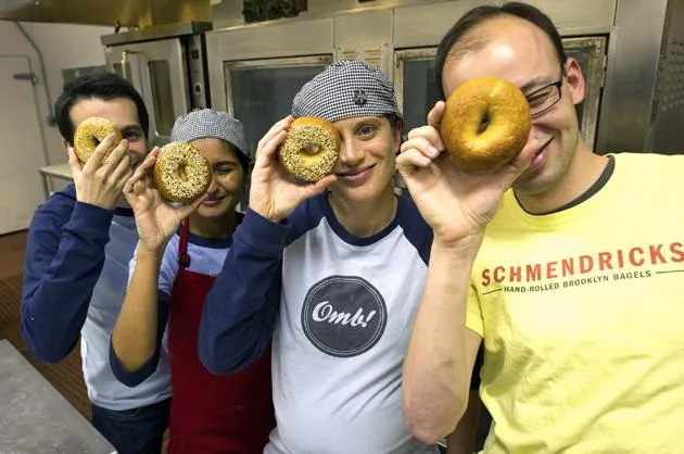 
  You’ve sold your app for $1 billion. (“It’s like Instagram, but only cat photos!”) What’s a comfortable tech entrepreneur to do next? Some turn to the culinary life. And with a famously high failure rate, opening a restaurant might be the only pursuit riskier than a tech startup.Daniel Scholnick (far left), Trinity Ventures partner Schmendricks this year introduced San Francisco to New York-style bagels (boiled not steamed). To keep costs down, the delivery service leases kitchen space from tech company Asana.
