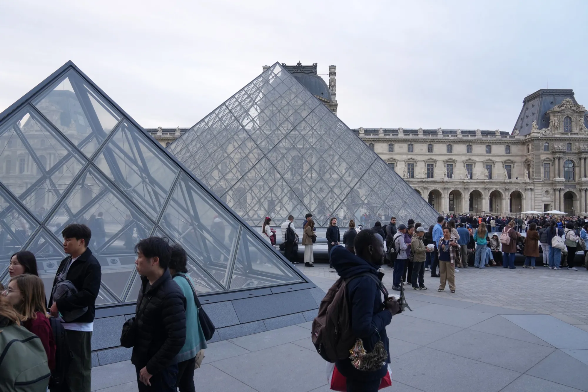 Visitors queue to enter the Louvre museum on Oct. 22.
