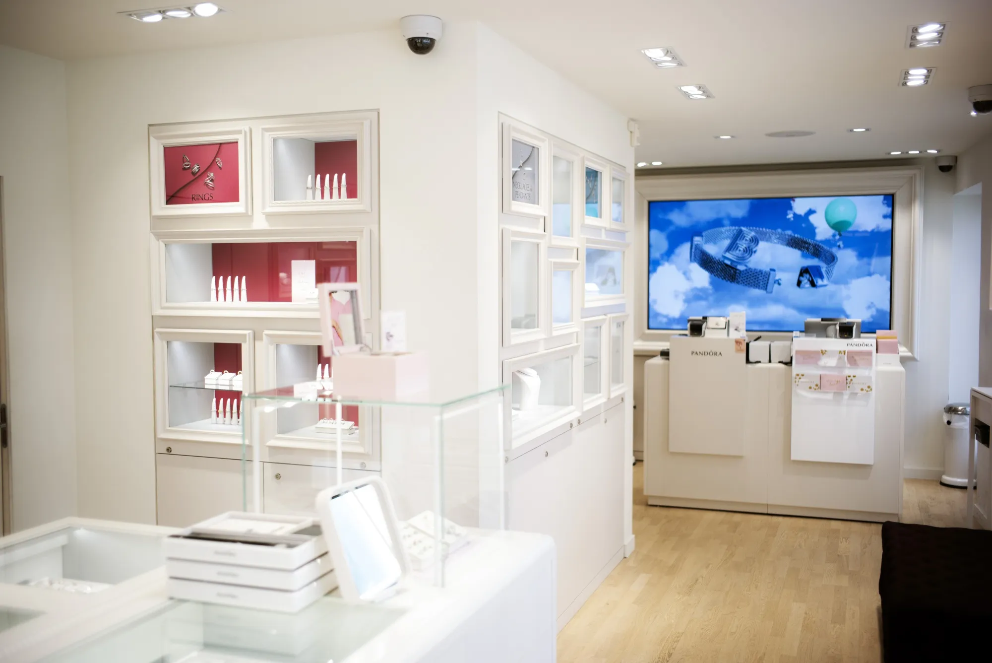 Jewelry on display inside a Pandora showroom in Copenhagen.