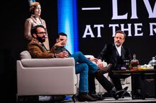 Matt Walsh—in skinny jeans—onstage with Ben Shapiro and Jeremy Boreing at a <em>Daily Wire</em> event in 2021.
