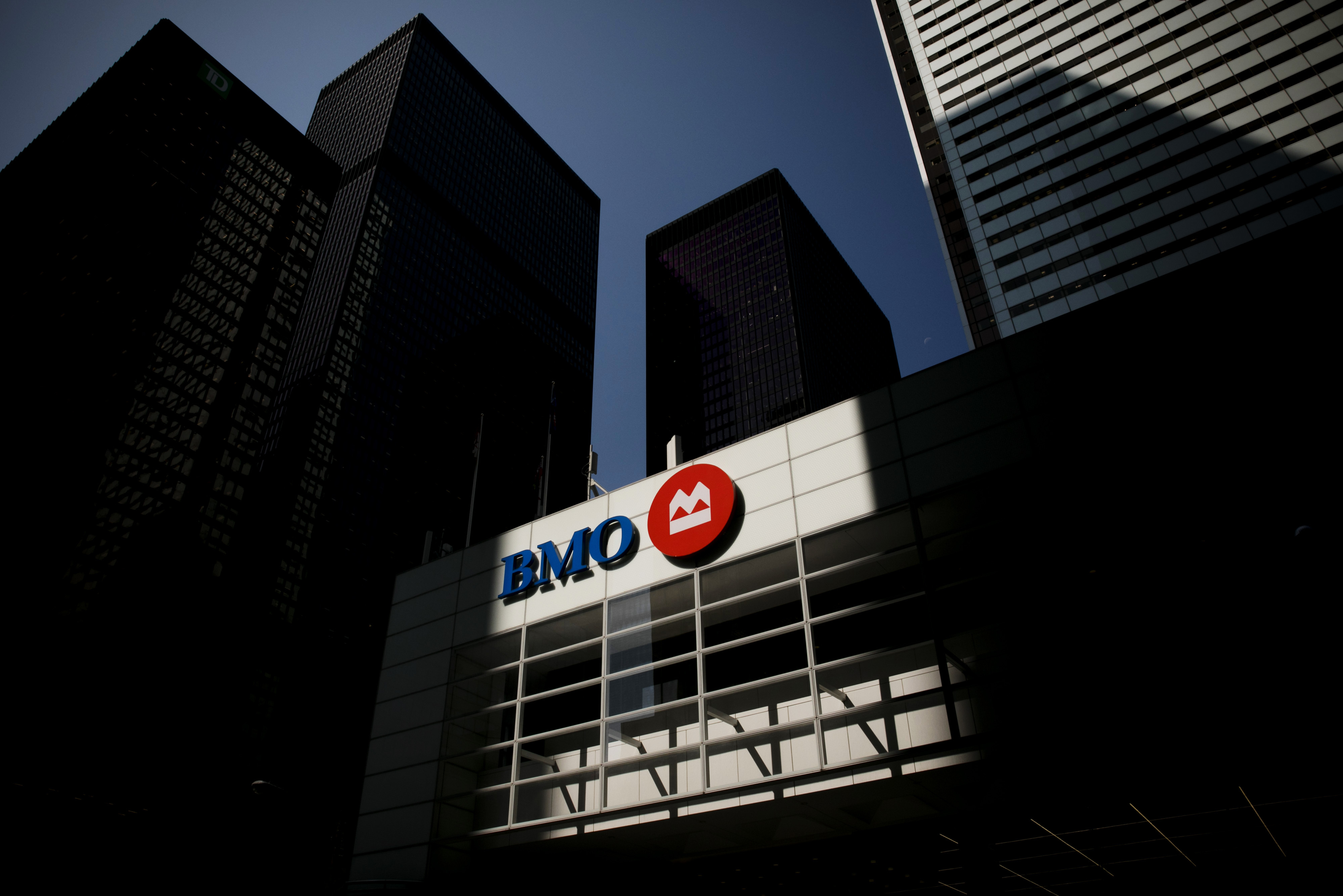 Bank of Montreal (BMO) signage was displayed on a building in the financial district of Toronto, Ontario, Canada on Thursday, July 25, 2019. Canadian stocks fell as tech heavyweights Shopify Inc. weighed on the benchmark and investors they continued to flee from the grass companies.