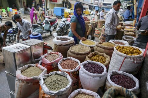 A customer browses pulses at a local market in Hyderabad.