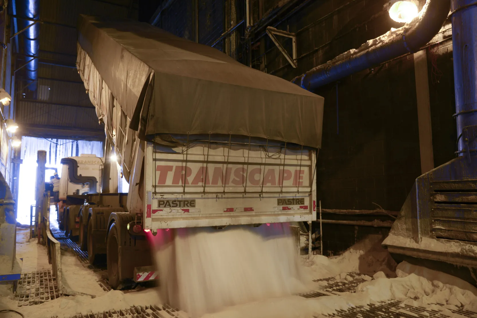 Sugar is unloaded from a truck at the Port of Santos in Santos, Brazil.