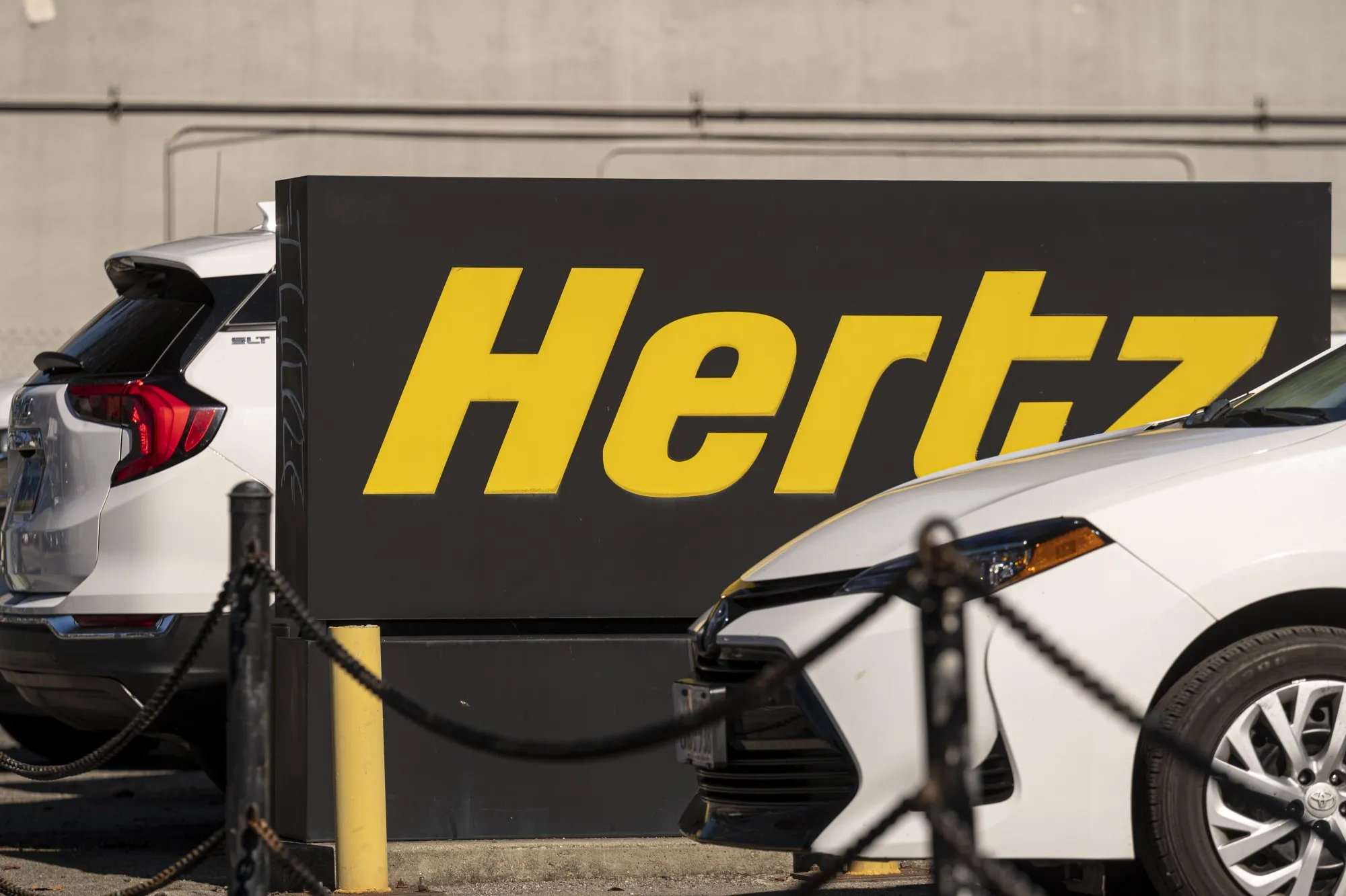 Cars on a Hertz car rental lot in Berkeley, California.