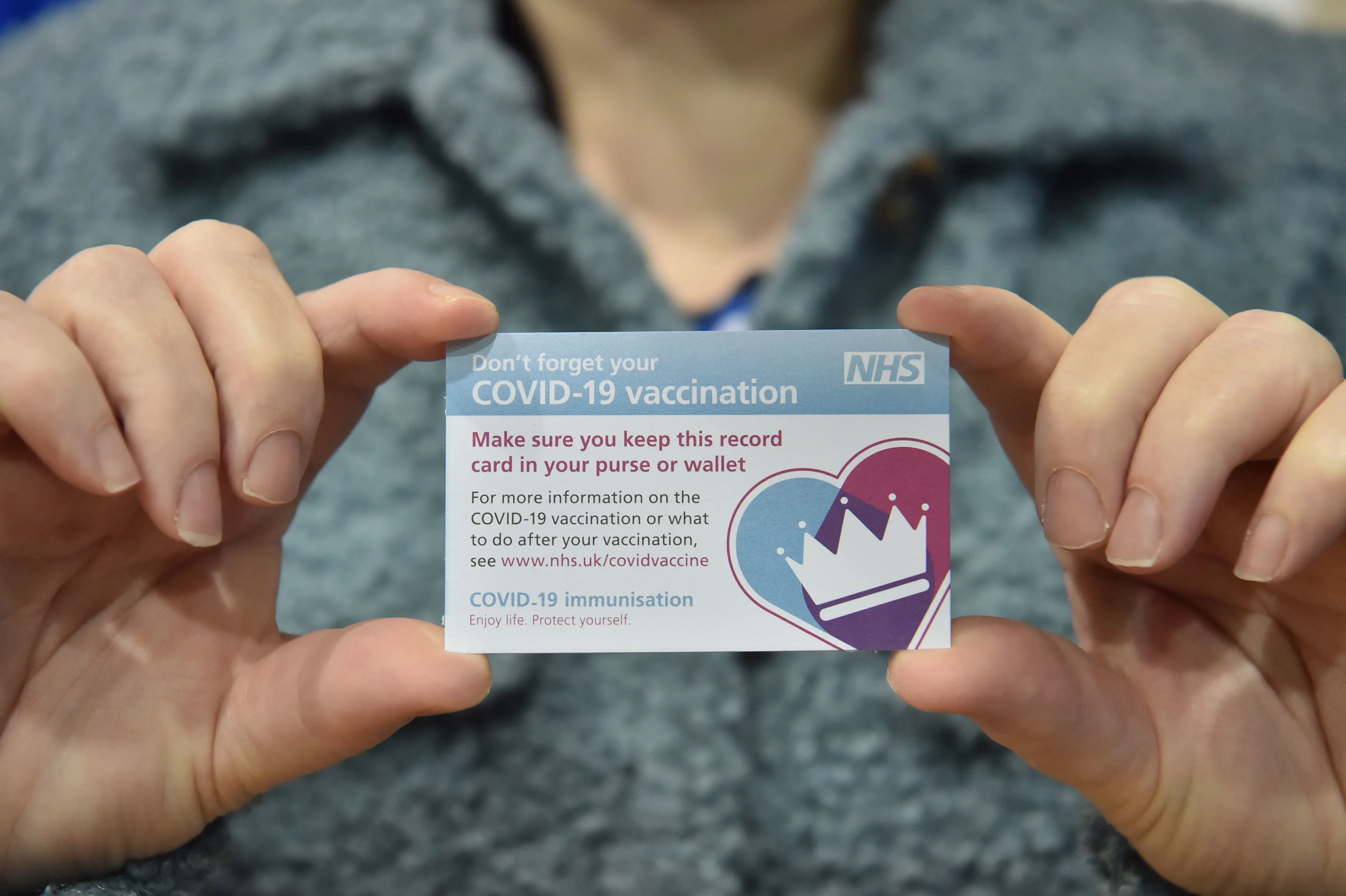 A Covid-19 Vaccination Record Card at a vaccination centre in Cardiff, U.K.