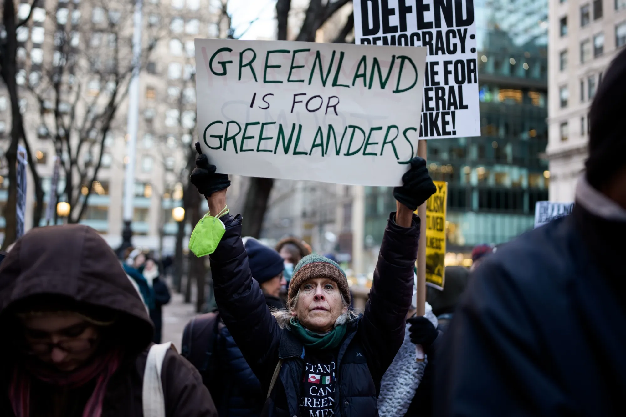 A demonstrator holds a Greenland poster at a protest against Immigration and Customs Enforcement in New York on Jan. 20.