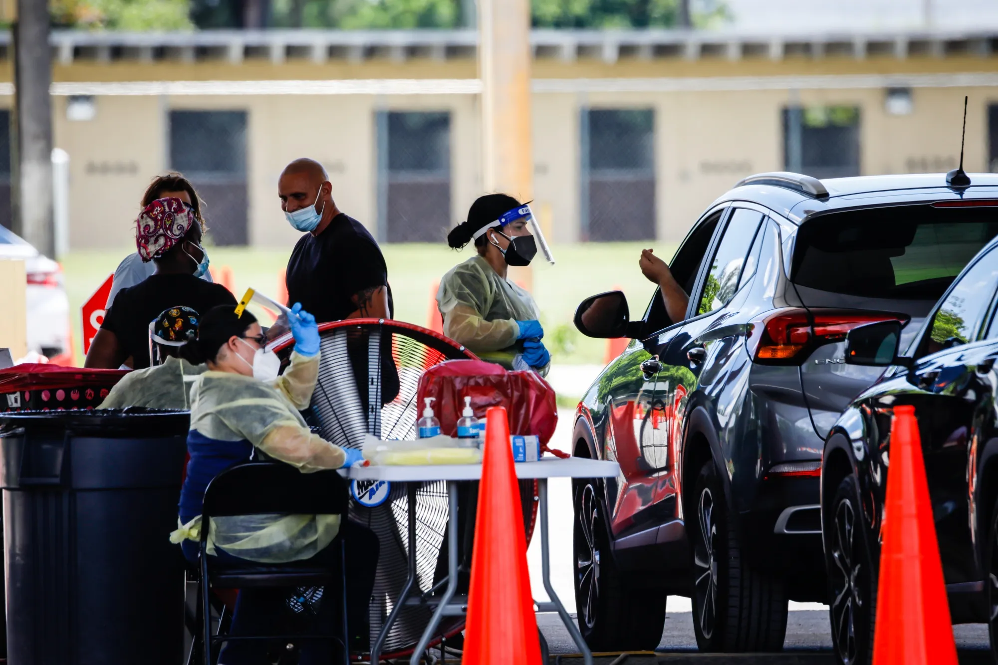 Healthcare workers administer&nbsp;Covid-19 swab tests at a site in Miami, Florida, on Aug. 6.