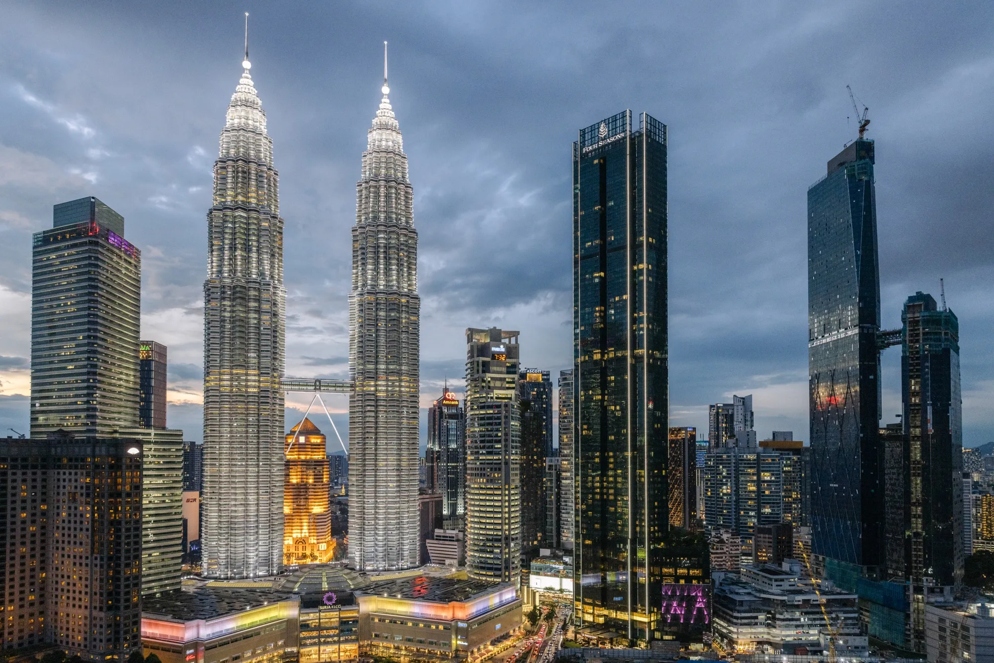 The Petronas Twin Towers at dusk in Kuala Lumpur, Malaysia.