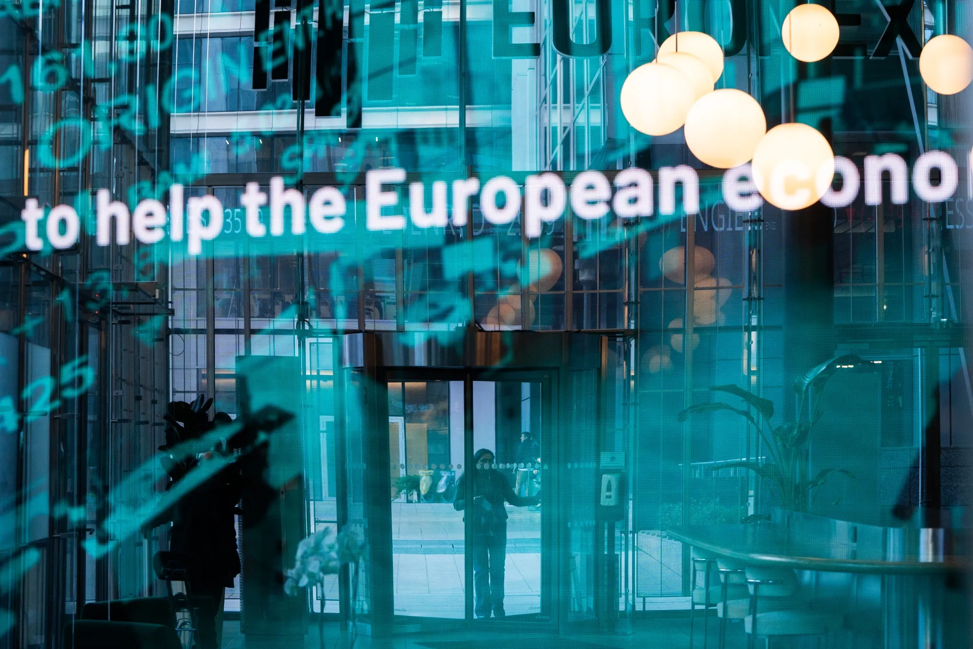 The reflection of a digital board at the Euronext NV stock exchange in Paris.