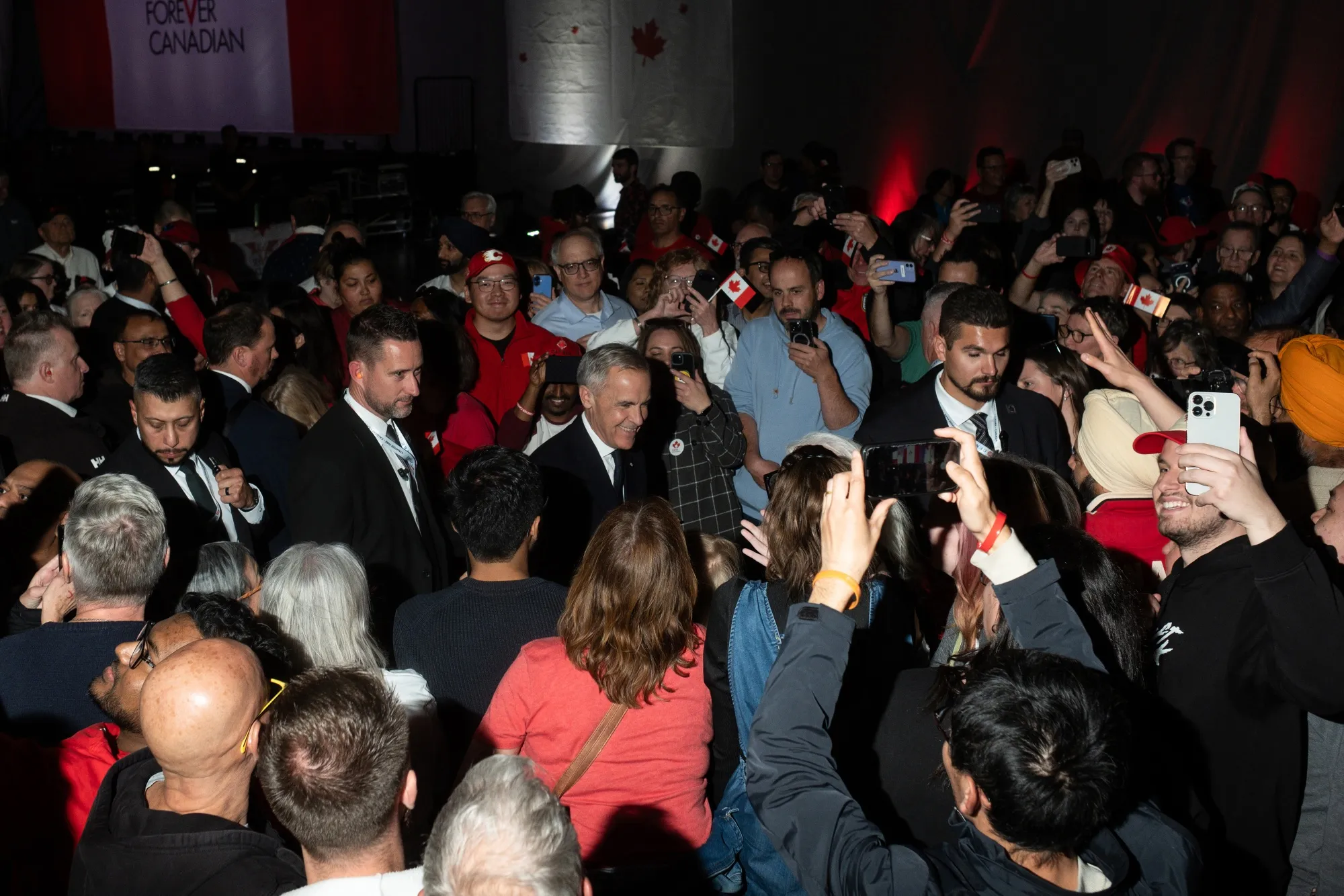Mark Carney, Canada’s prime minister, center, during a Forever Canadian rally in Calgary.