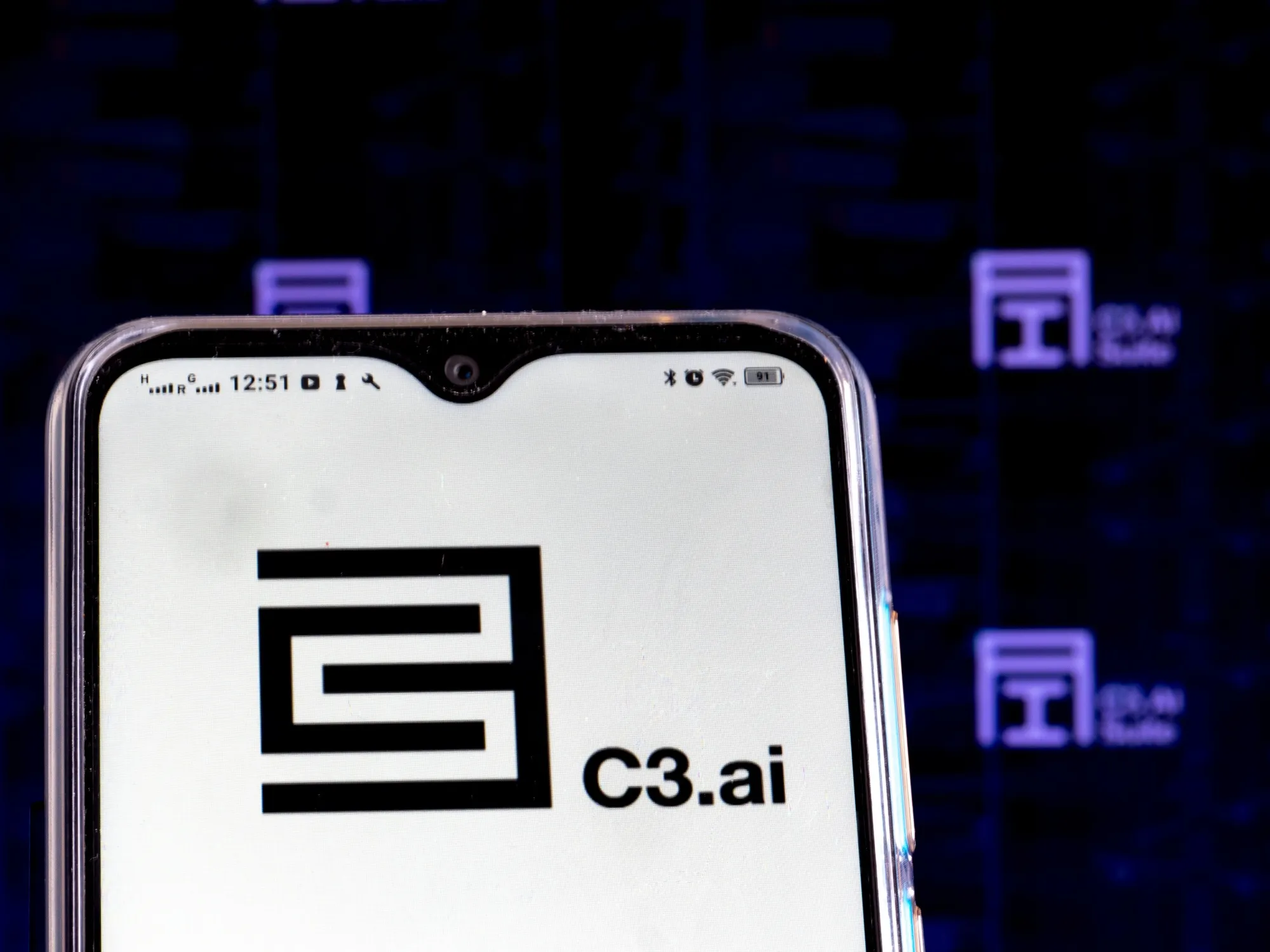 In this photo illustration a C3.ai, Inc. logo is seen