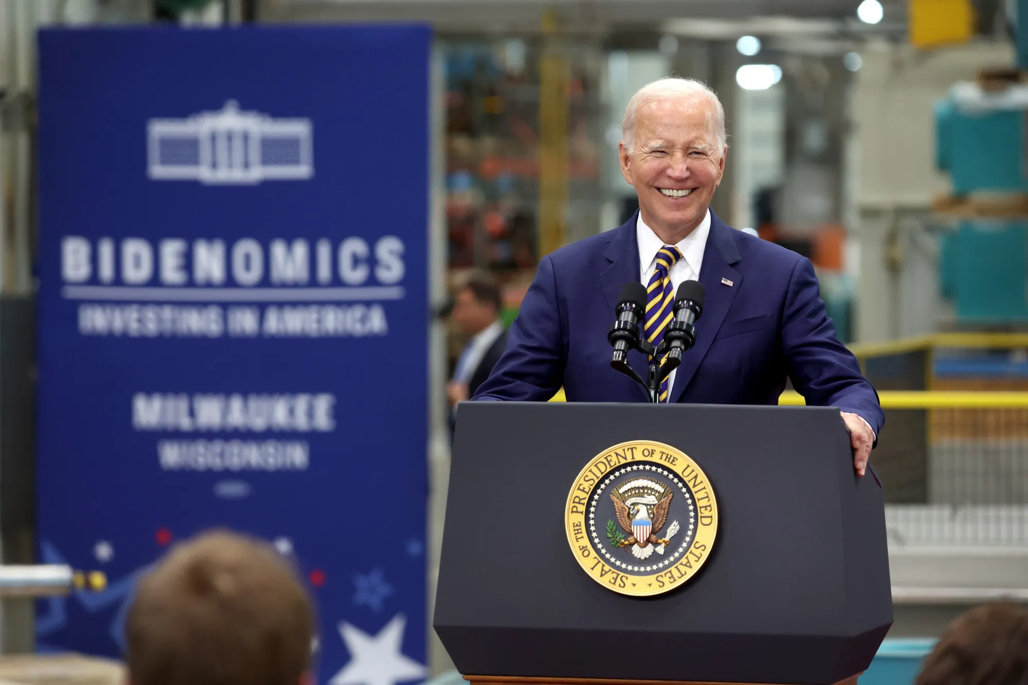Joe Biden speaks at an electrical equipment manufacturer in Milwaukee, Wisconsin in August.&nbsp;