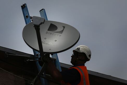 A DirecTV Technician Installs a New Satellite TV Dish