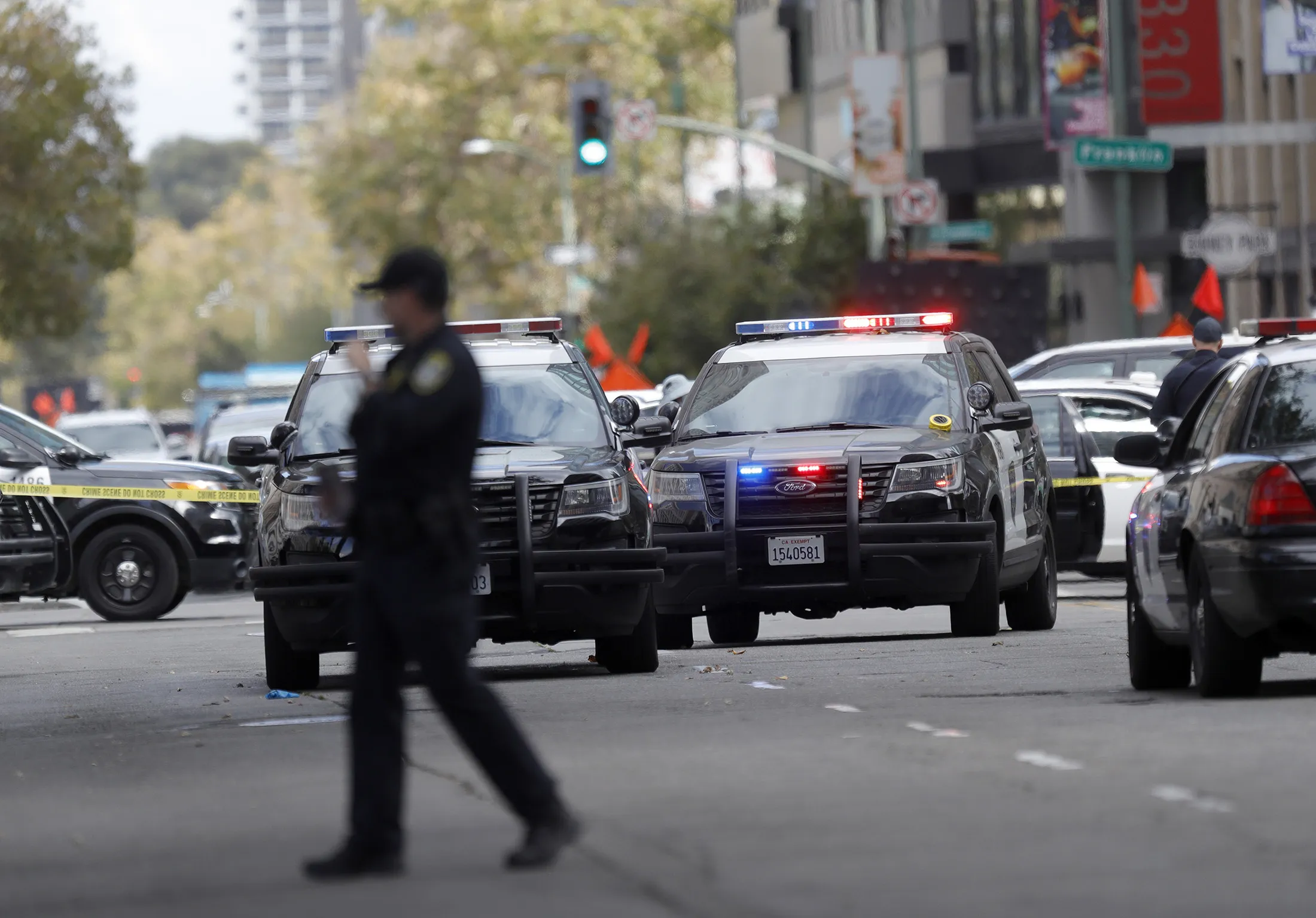 Police investigate a fatal shooting&nbsp;in downtown Oakland, California,&nbsp;on&nbsp;Sept. 20, 2022.