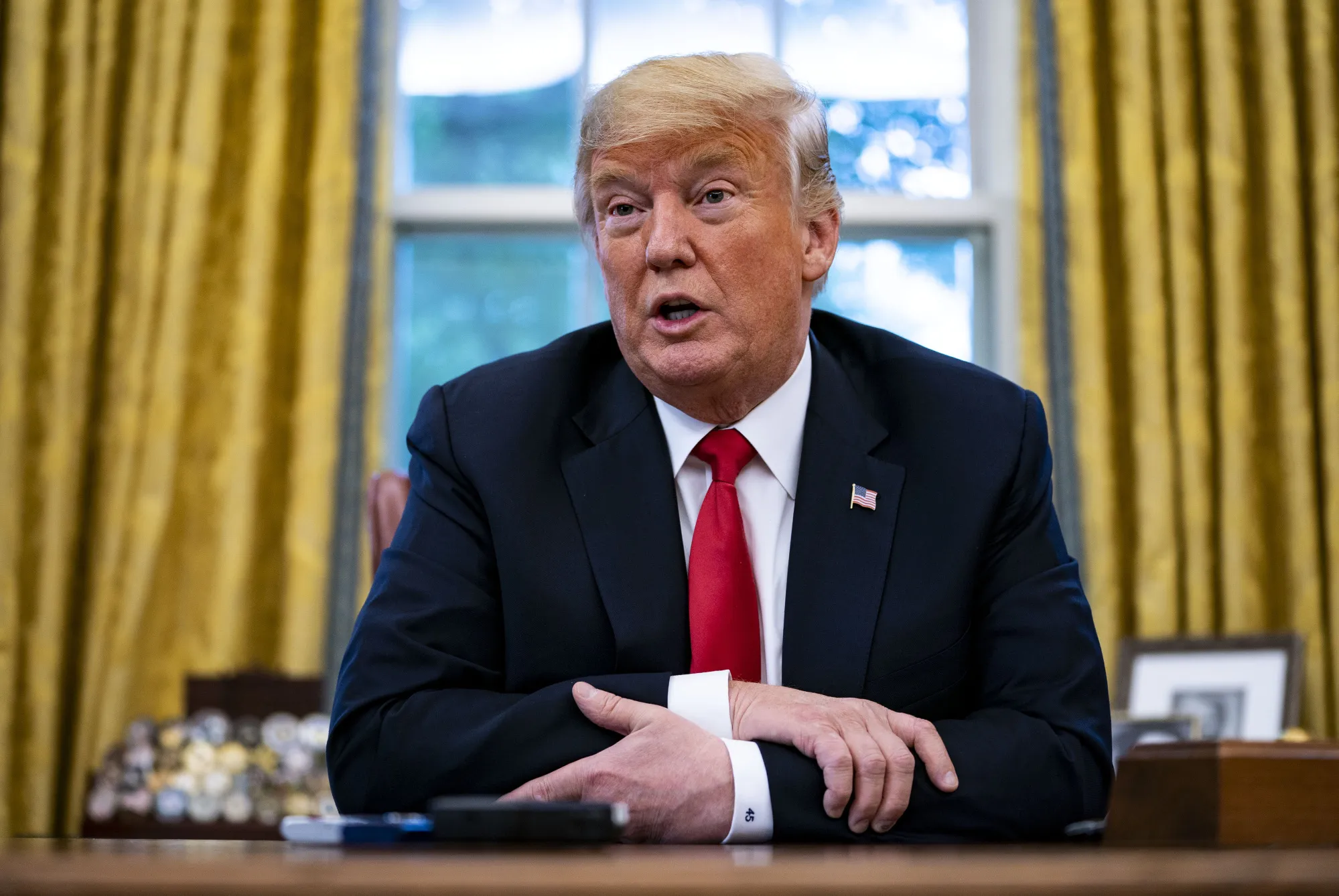 Donald Trump speaks during an interview in the Oval Office of the White House in Washington, D.C., on&nbsp;Aug. 30, 2018.