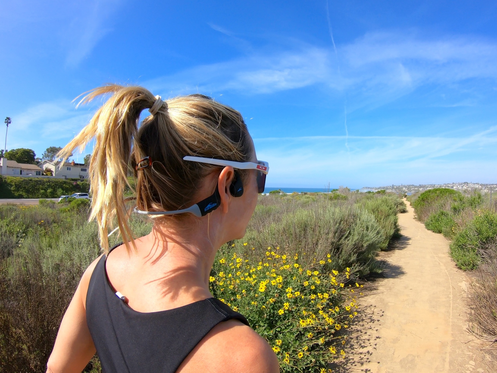 The H20Audio Tri 2 Multi-Sport headphones are ultra-light and sit over your ears, vibrating noise into your head through your cheekbones. 