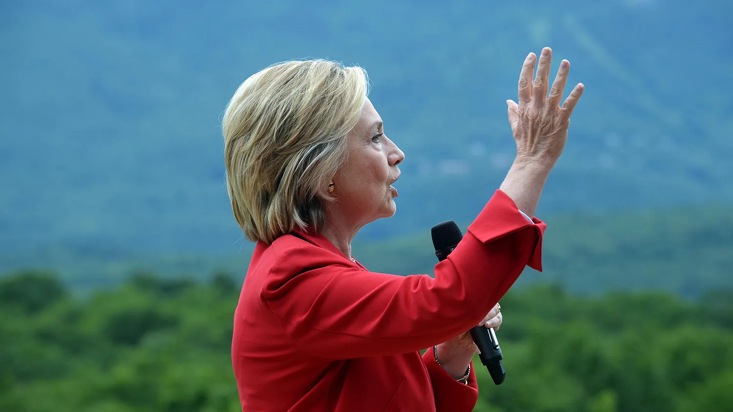 Democratic president candidate Hillary Clinton speaks at an organizing event at a private home July 4, 2015 in Glen, New Hampshire.
