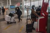 Travelers at Beijing Airport ahead of Lunar New Year Holidays 