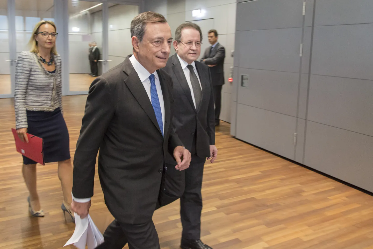 Mario Draghi doing the walk and talk.
