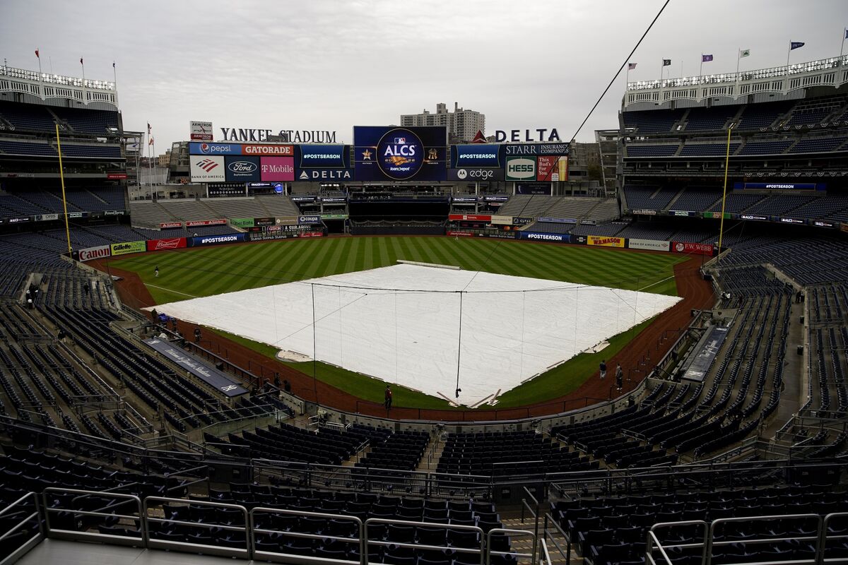 Red Sox rally after lengthy rain delay to defeat Astros