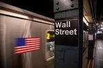 A train departs the Wall Street subway station near the New York Stock Exchange.