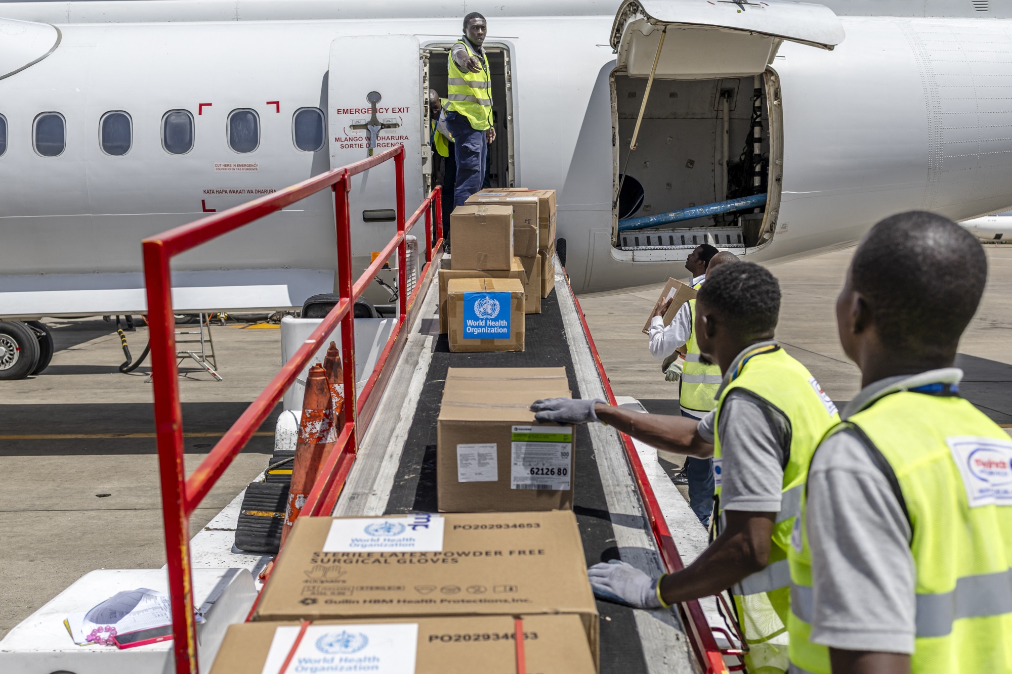 Ground crews load medical supplies onto a United Nations Humanitarian Air Service operated charter plane bound for the Democratic Republic of Congo at Jomo Kenyatta International Airport in Nairobi on May 20.