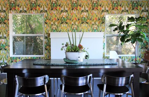 The birds-of-paradise print, installed in a dining room.