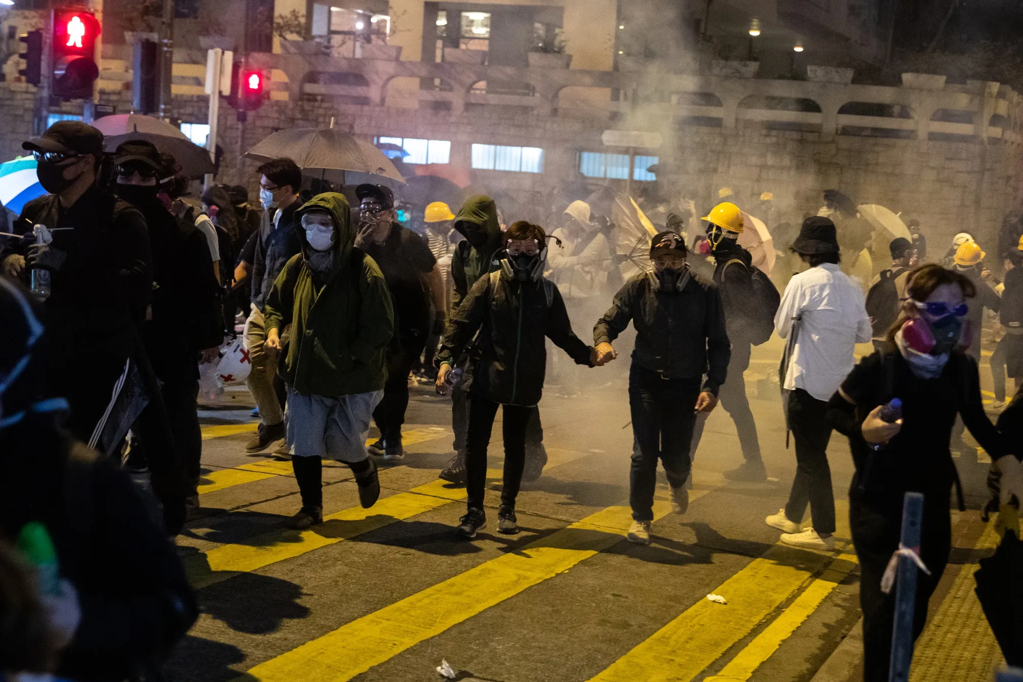 Demonstrators and riot police clash during a protest on Nov. 18.