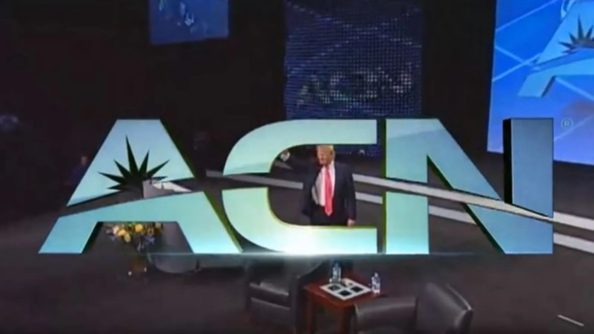 An ACN promo featuring Trump.