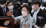 Former South Korean 'comfort woman' Lee Yong-soo speaks to the media after a court ruling in Seoul on April 21.
