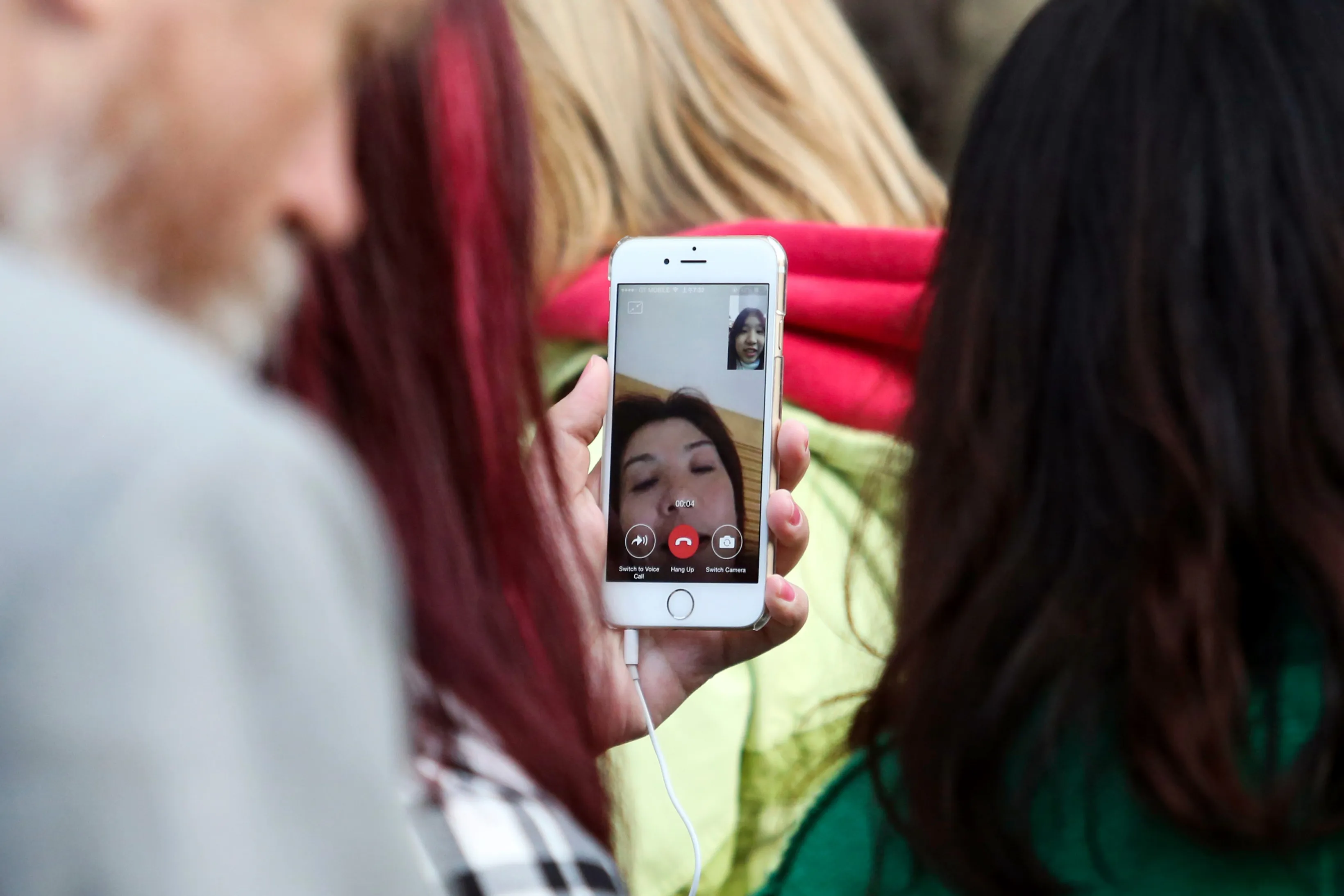 Apple's New IPhone Hits Stores As CEO Faces Growth Questions
