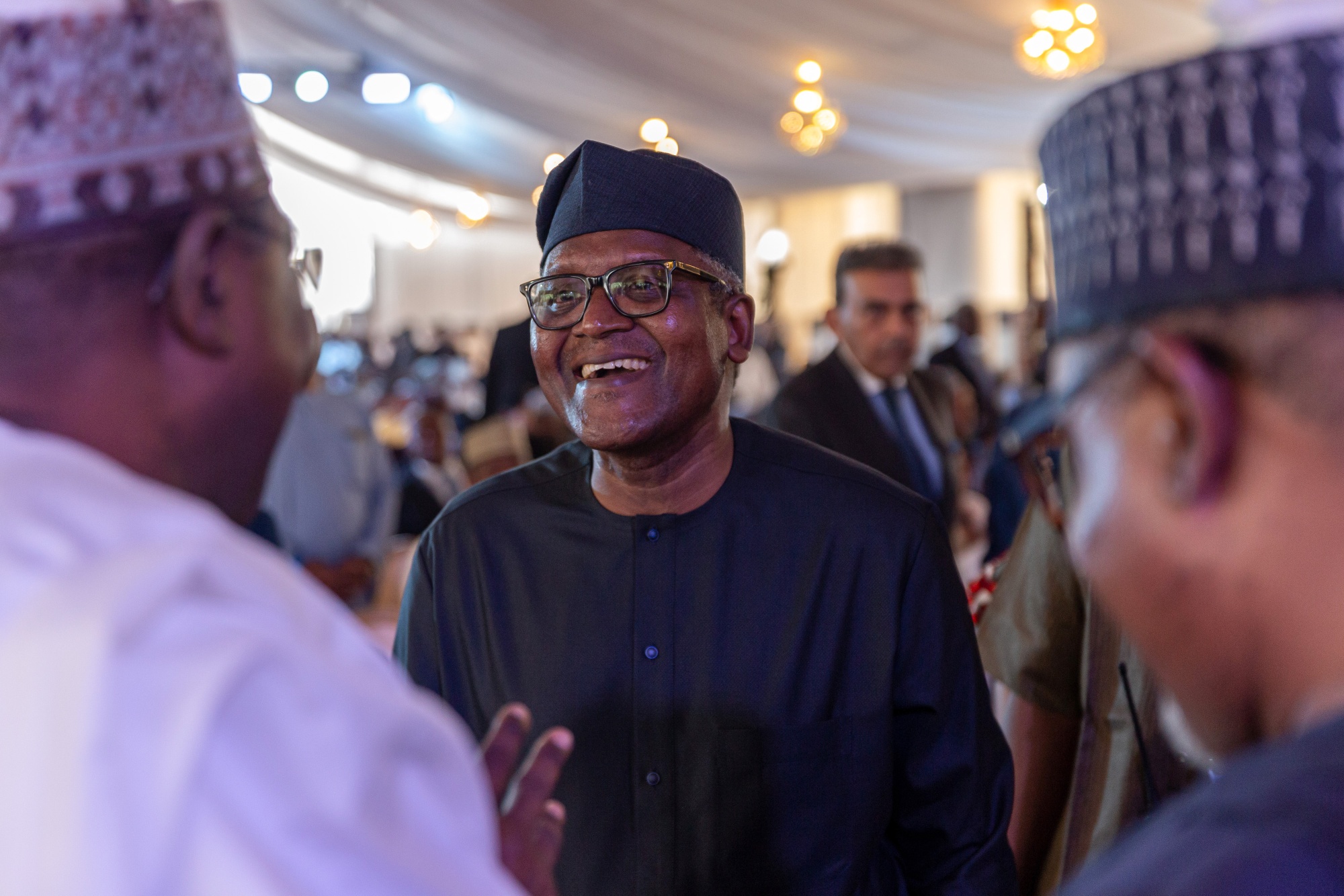 Aliko Dangote, billionaire and chief executive officer of Dangote Group, during the commissioning ceremony of the Dangote Industries Ltd. oil refinery and fertilizer plant site in the Ibeju Lekki district of Lagos, Nigeria, on Monday, May 22, 2023. Aliko Dangote, Africa's richest person, announced the opening of a mega refinery in Nigeria — seven years late — to a backdrop of skepticism about how fast it will really be able to ramp up. Photographer: Benson Ibeabuchi/Bloomberg