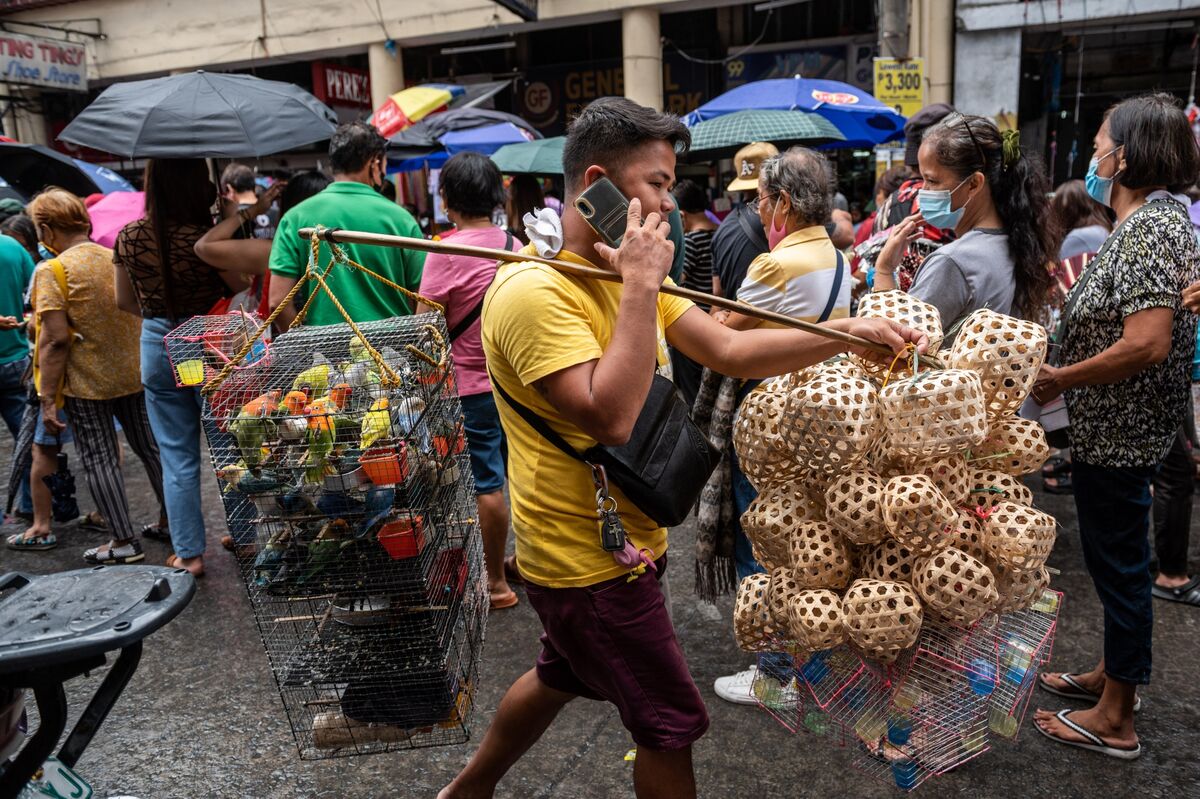 Marcos Rally Inflation Philippines’ Marcos Rating Plunges Amid Stubborn Inflation - Bloomberg