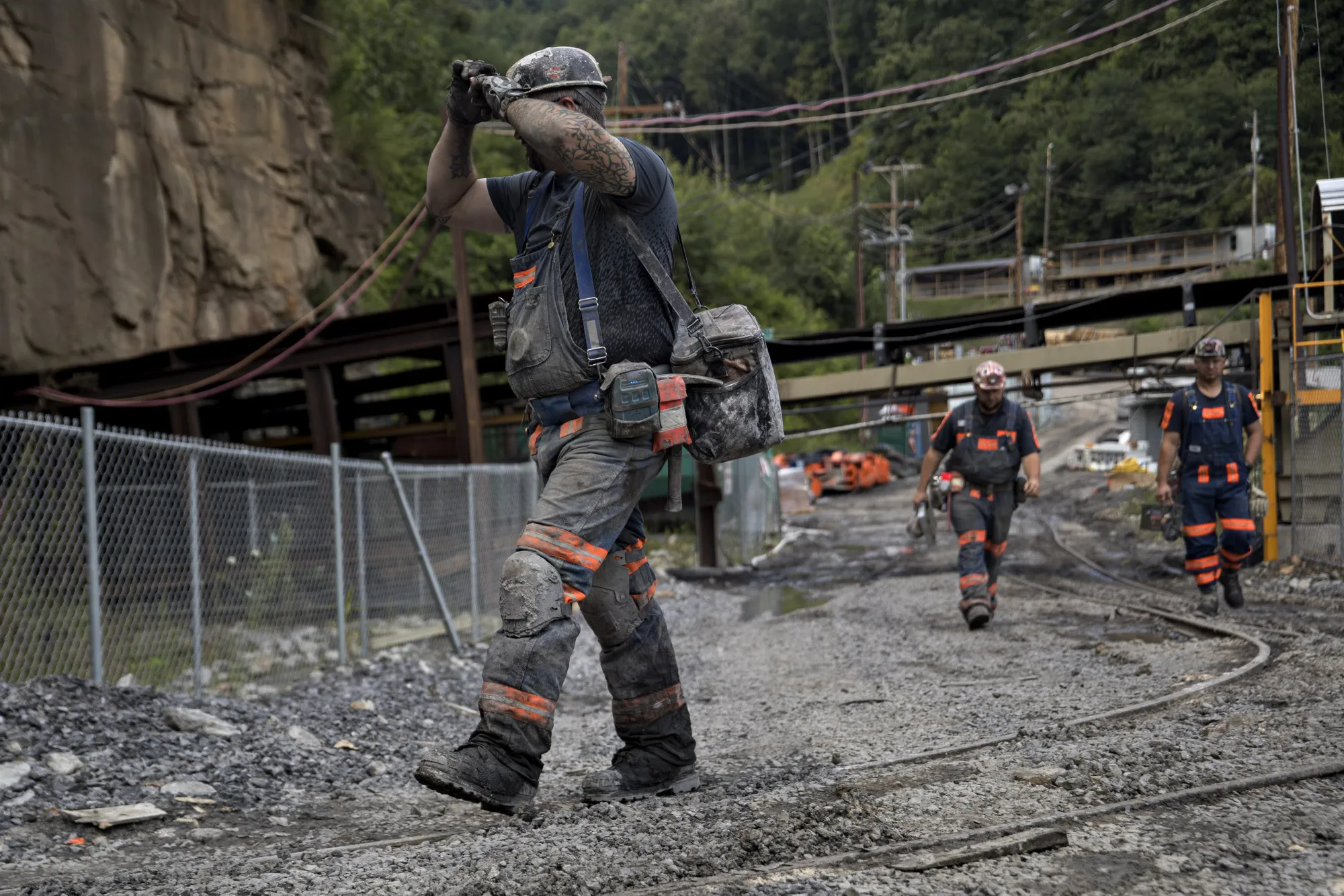 A miner turns on his headlamp while walking into the entrance of a&nbsp;Ramaco Resources&nbsp; mine near Wylo, West Virginia.