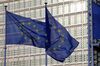 European Union (EU) flags fly outside the Berlaymont building in Brussels, Belgium, on Friday, Dec. 18, 2020. Britain’s chief Brexit negotiator, David Frost, warned progress in the talks has been “blocked and time is running out” as leaders from both sides played down expectations a deal will be reached.