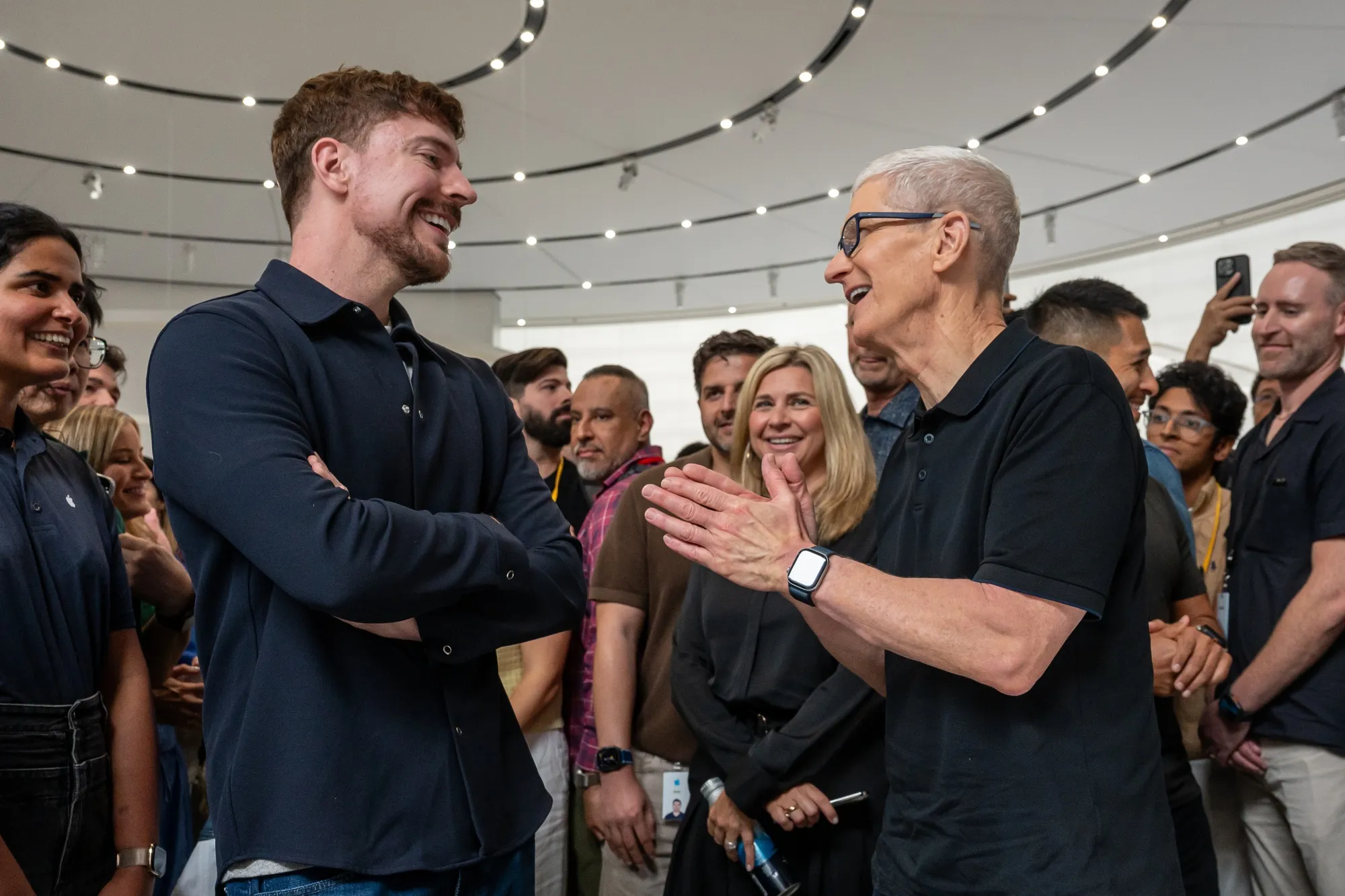 Tim Cook, chief executive officer of Apple Inc., right, and MrBeast during an event at Apple Park campus in Cupertino, California, US, on Tuesday, Sept. 9, 2025.&nbsp;