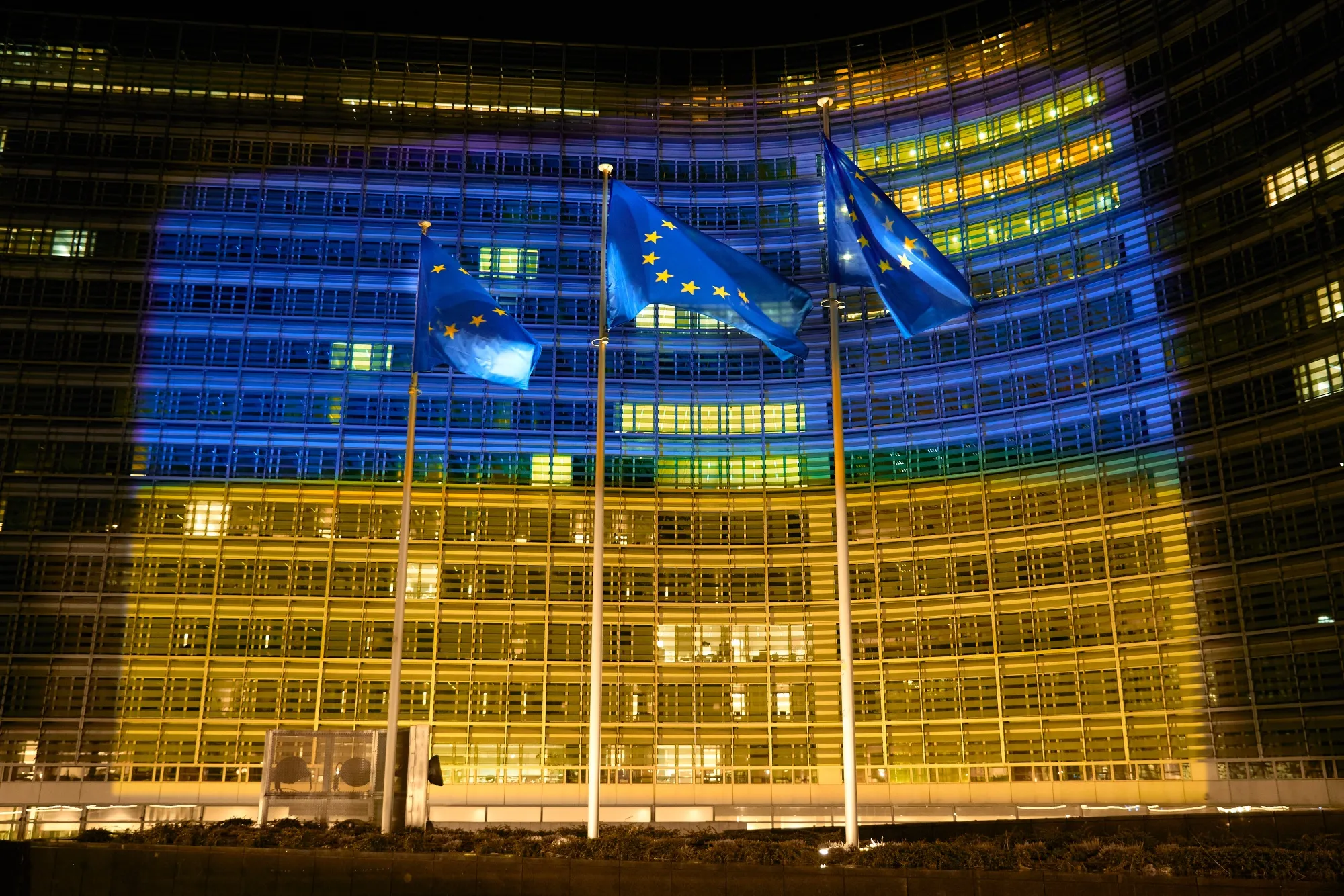 The EU's Berlaymont building lit up in the colours of the Ukrainian national flag.