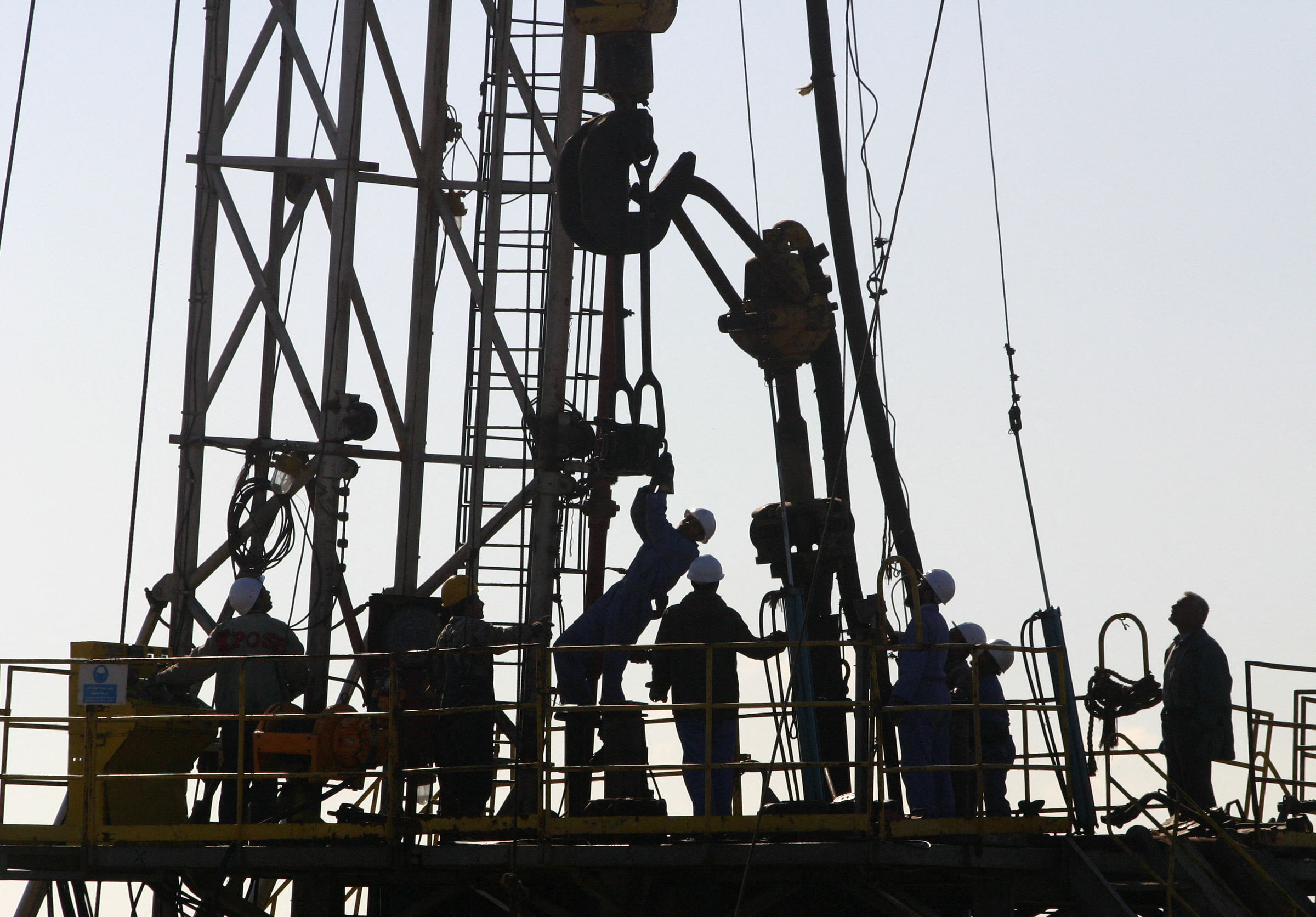 IRAQ-OIL Iraqi workers at the Shirawa oil field outside the northern city of Kirkuk. 