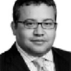 Headshot of J Conrad Garcia
