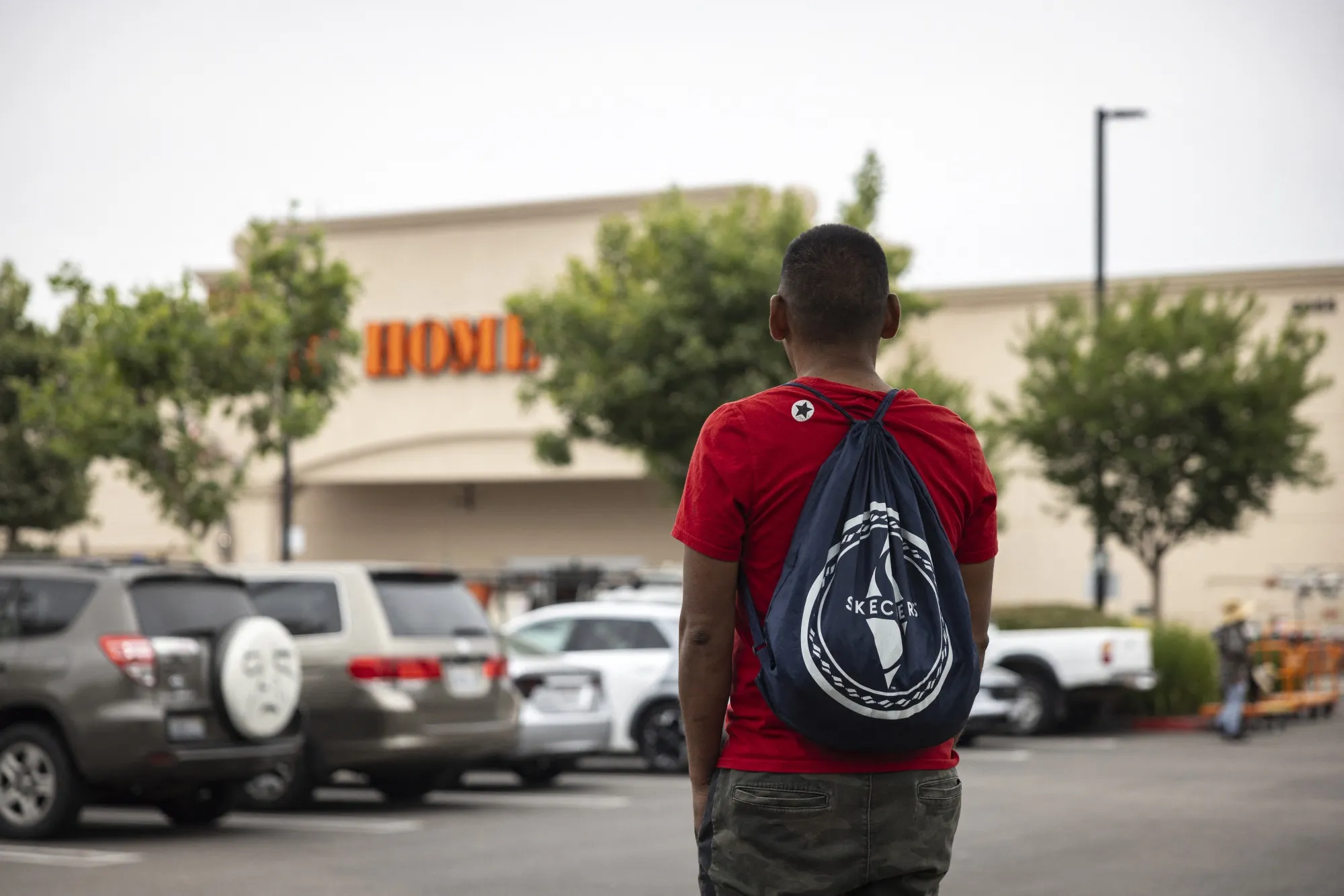 Standing outside a hardware store is not a crime.