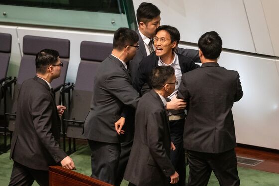 Ex-Hong Kong Lawmakers Arrested in Latest Blow to Opposition