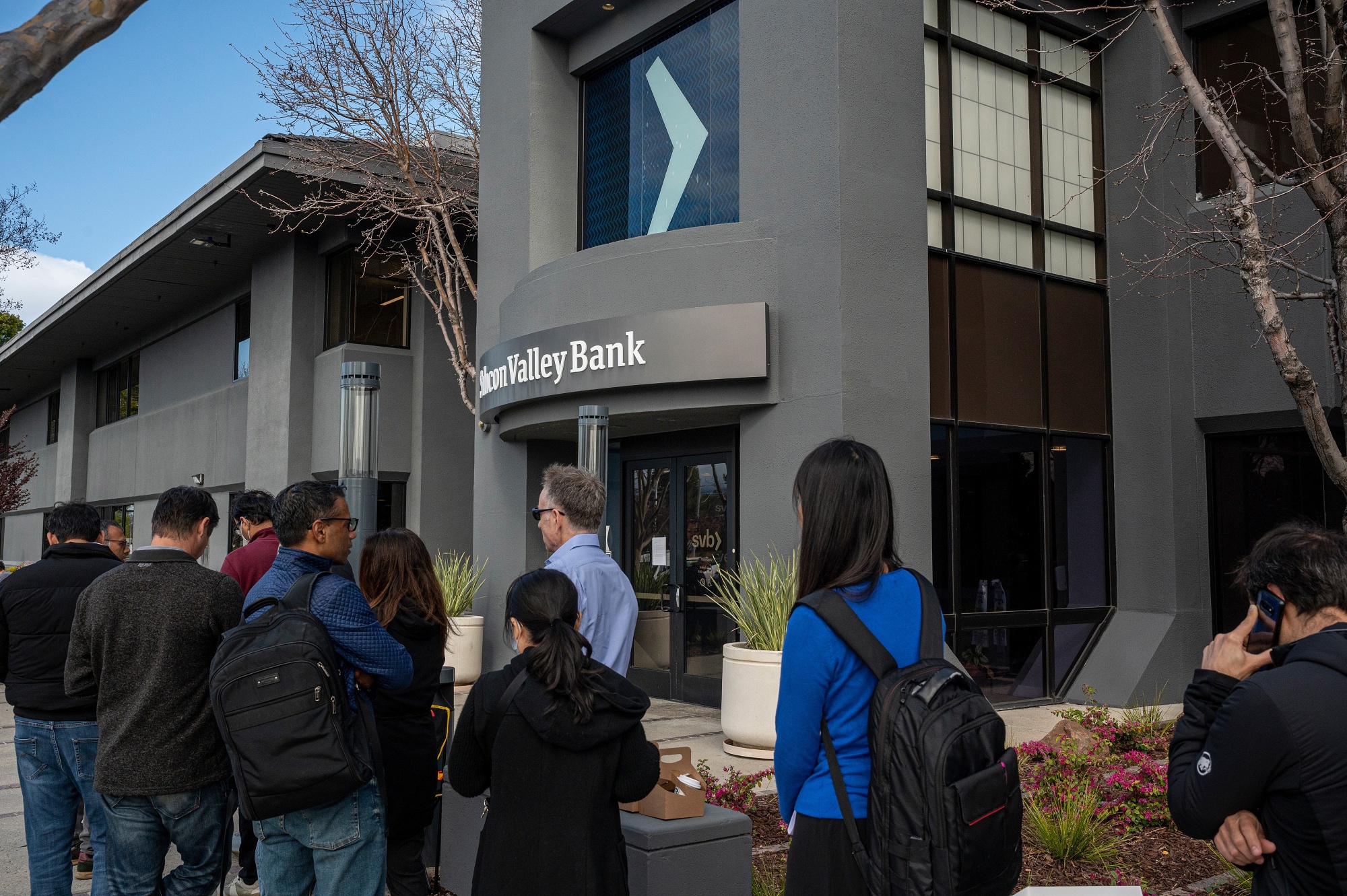 Customers in line outside Silicon Valley Bank headquarters in Santa Clara, California, on&nbsp;March 13.